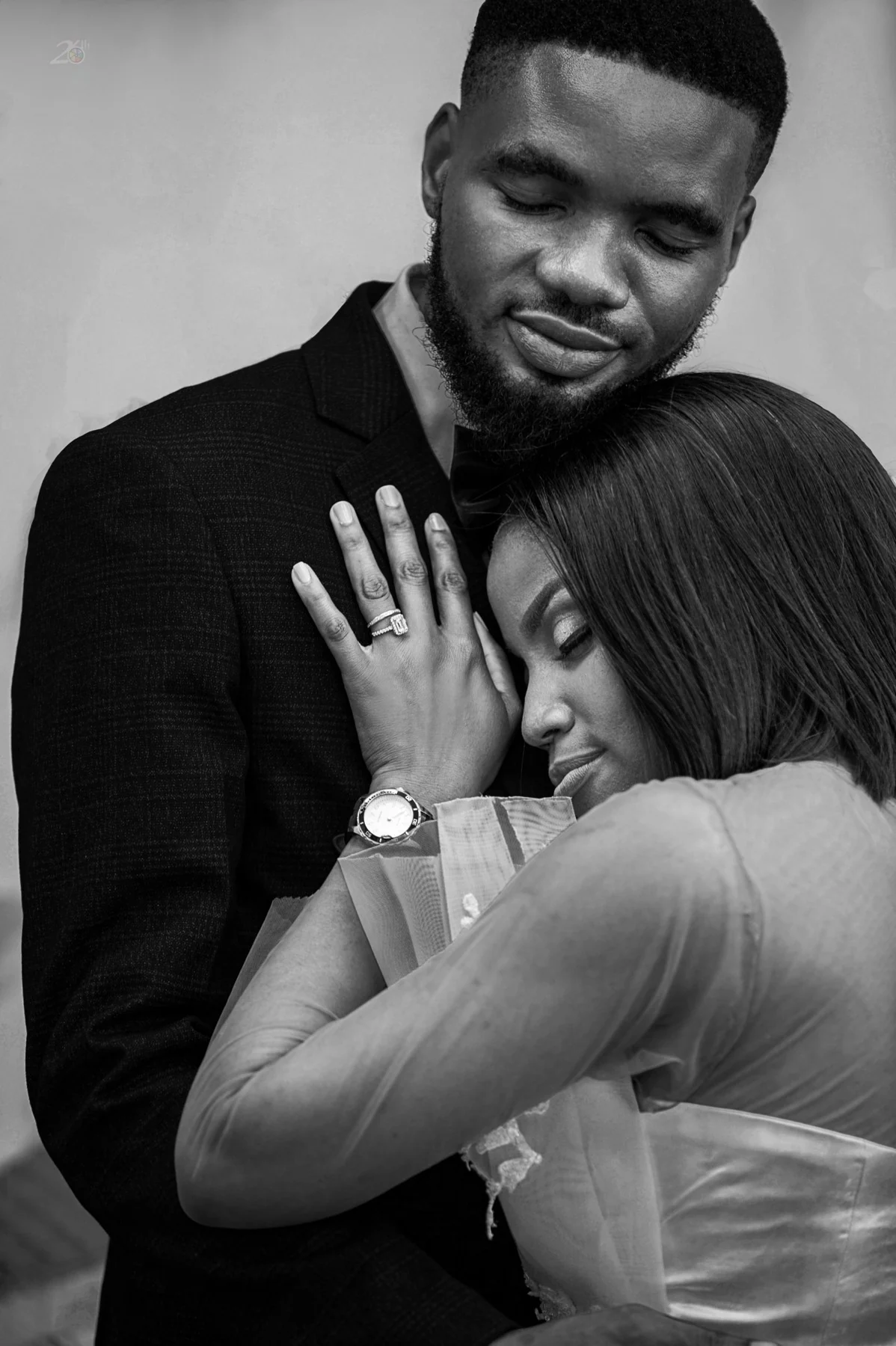 Black and white pre-wedding embrace