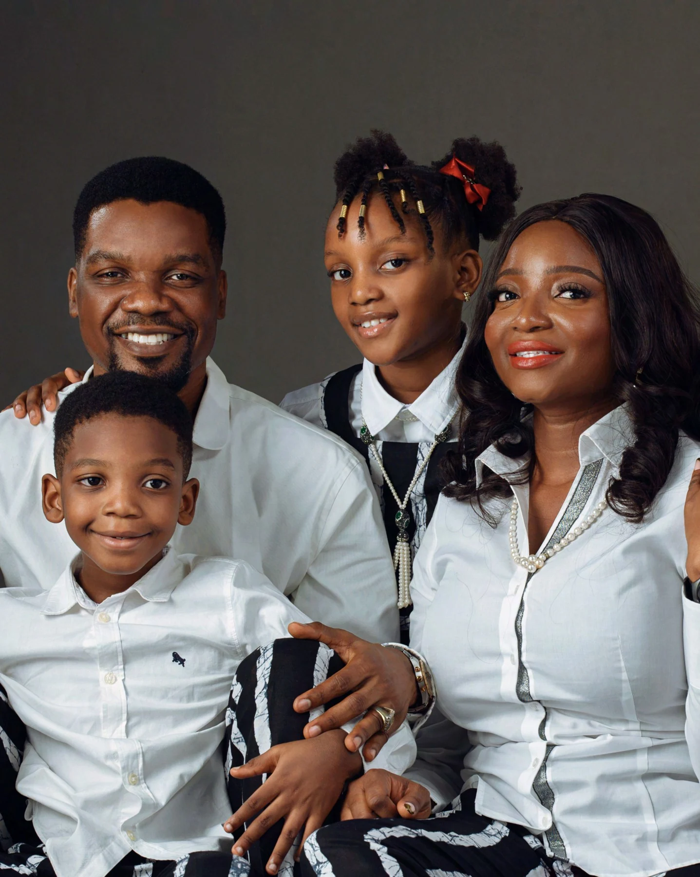 Family portrait in coordinated white outfits