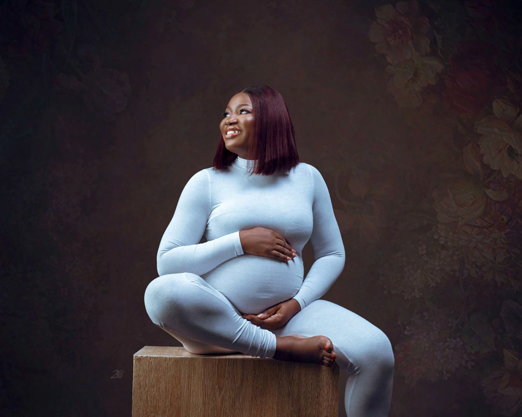 Maternity portrait in a blue dress